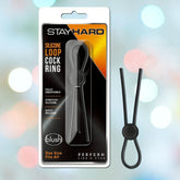 The image showcases the "Stay Hard Silicone Loop Cock Ring - Black," highlighting its full adjustability, stretchy silicone material, and quick-release feature. The product is designed by Stay Hard to comfortably fit all sizes.